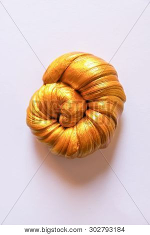 Golden Plasticine Soft Stretchable Texture. Anti-stress Toy For Kids Activities, Handmade, Fun.