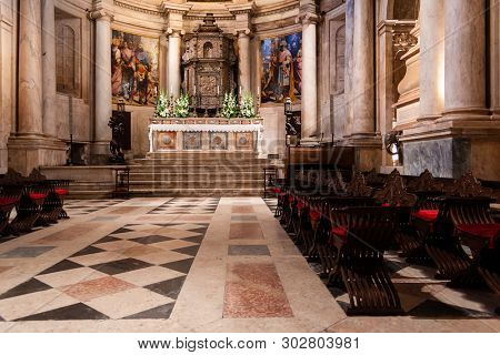 Lisbon, Portugal - June 30, 2018: Mannerist Main Chapel or Capela-Mor, Altar, Retable or Altarpiece and Tabernacle at Jeronimos Monastery or Abbey aka Santa Maria de Belem. UNESCO World Heritage Site.