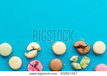 Brignt Macarons For Sweet Break On Blue Background Top View Mock Up