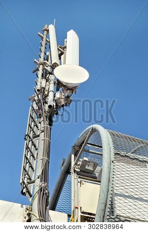Telecommunication Base Stations Network Repeaters. The Cellular Communication Aerial On A Building. 