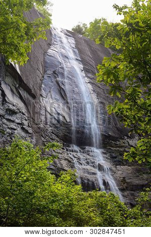 Hickory Nut Falls Framed By Spring Foliage At Chimney Rock State Park In North Carolina