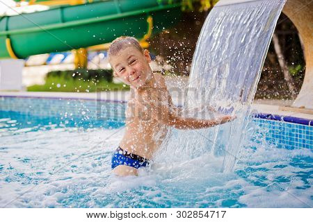 Child Sports In A Childrens Outdoor Pool