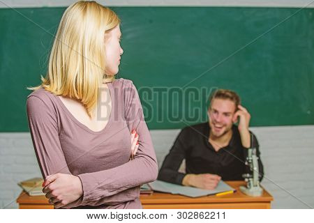 Speaking In Front Of The Class. University Student. High School Student Answering At Seminar. Female