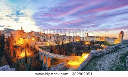 Gravina In Puglia Ancient Town, Bridge And Canyon At Sunrise. Panoramic View Of Old City Gravina In 