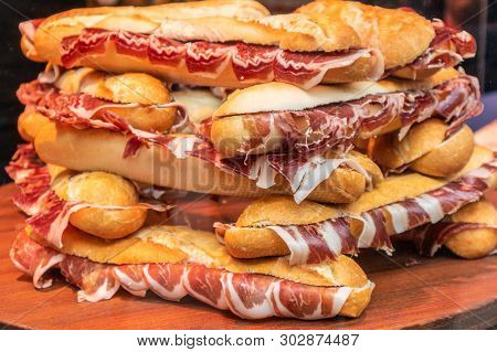 Pile Of Ham Sandwiches In A Storefront In London, England.