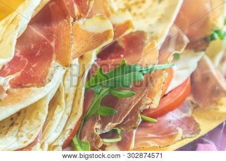 Pile Of Ham Sandwiches In A Storefront In London, England.