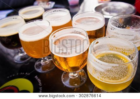 Glasses With Beer Degustation In Bruges, Belgian, Europe