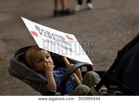 Stockholm, Sweden - May 24, 2019: Kid Holding A Poster In The Global Strike For Future, A Demonstrat