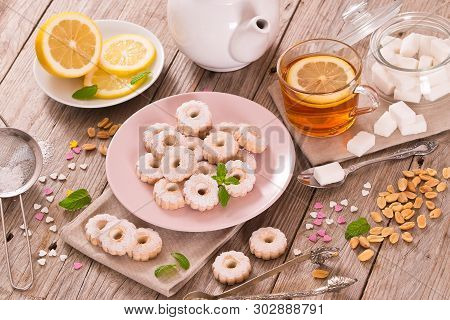 Canestrelli Biscuits With Mint On White Dish.