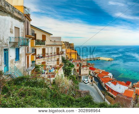 Beautiful Seaside Town Village Scilla With Old Medieval Castle On Rock Castello Ruffo, Colorful Trad