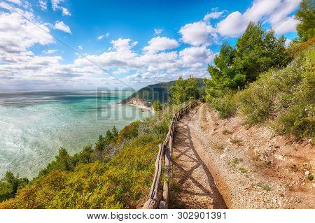 Picturesque Islets Faraglioni Di Puglia In Summer Adriatic Sea Bay Baia Delle Zagare. Mattinata Fara