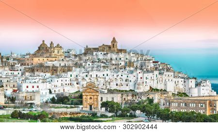 Ostuni White Town Skyline At Sunrise. Brindisi, Apulia Southern Italy. Europe.