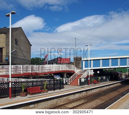 Brighouse, West Yorkshire, United Kingdom - 24 May 2019: A View Of The Platforms And Footbridge Of B
