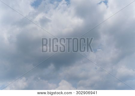 Beautiful Bright Blue Sky With White Fluffy Clouds On A Clear Sunny Day. Royalty High-quality Free S