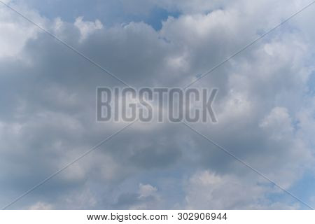 Beautiful Bright Blue Sky With White Fluffy Clouds On A Clear Sunny Day. Royalty High-quality Free S