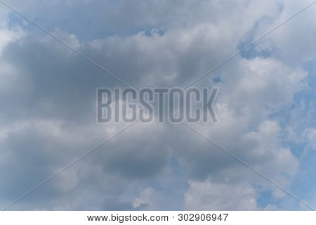 Beautiful Bright Blue Sky With White Fluffy Clouds On A Clear Sunny Day. Royalty High-quality Free S