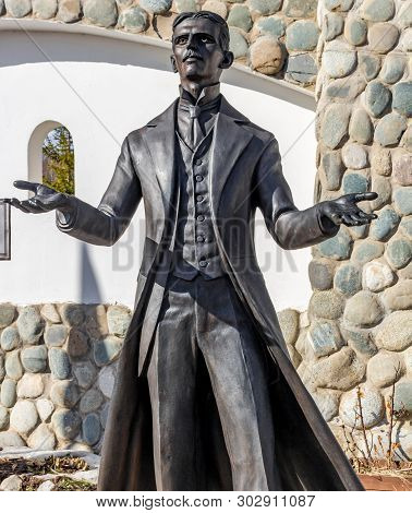 Kaluga Region, Russia - March 2019: Monument To Inventor And Scientist Nikola Tesla. Ethnographic Pa