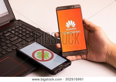 Kuala Lumpur, Malaysia, May 25, 2019: Person Holding Huawei Phones With No Android Signage,  And Ano