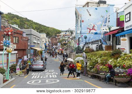 Busan, South Korea - April 2019: Tourists Visiting Gamcheon Culture Village, Famous Attraction With