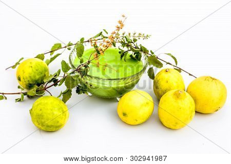 Lemon Face Pack Isolated On White I.e. Lime Juice Well Mixed With Tulsi Or Holy Basil's Juice.used F