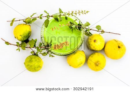 Lemon Face Pack Isolated On White I.e. Lime Juice Well Mixed With Tulsi Or Holy Basil's Juice.used F