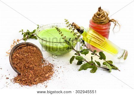 Tulsi Face Pack Isolated On White Consisting Of Sandal Wood Powder Well Mixed With Tulsi Leaves With