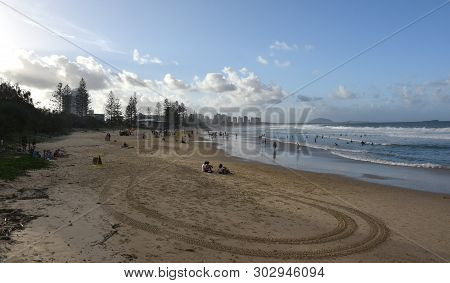 Alex Beach, Australia - Apr 21, 2019. People Relaxing At The Beach In Autumn Time Afternoon.  Alex I