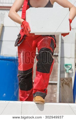 Woman Working With Airbricks