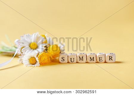 Bouquet Flower Camomila With Text Summer On Yellow Background. Summer Consept Background