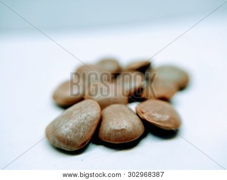 A Picture Of Black Lentil On White Background