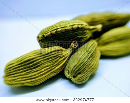 A Picture Of Cardamom On White Background