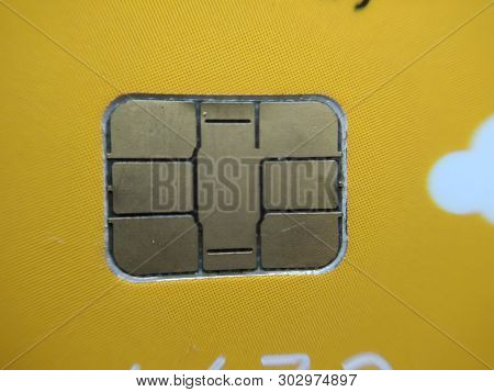 A Picture Of Debit Card With Yellow Background