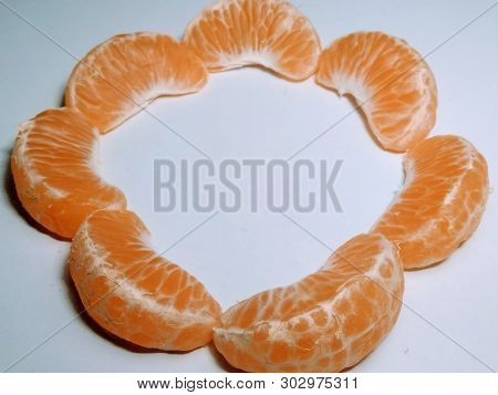 A Picture Of Orange Slices On White Background