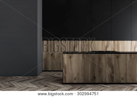 Interior Of Minimalistic Kitchen With Gray, Black And Wooden Walls, Wooden Floor And Wooden And Blac