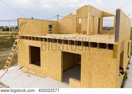 Construction Of New And Modern Modular House. Walls Made From Composite Wooden Sip Panels With Styro