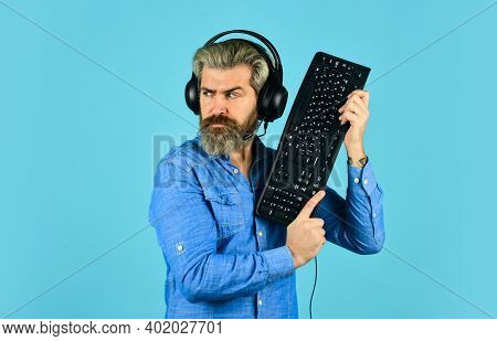 Online Cyber E-sport Internet. Gamer Playing Computer Game. Digital Music Creation. Bearded Man Head