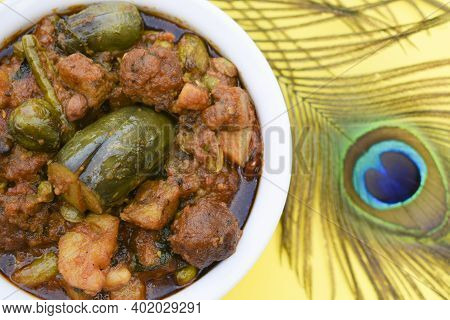 Indian Gujarati Special Dish Variety Undhiyu Or Undhiya Closeup With Yellow Background, Background D