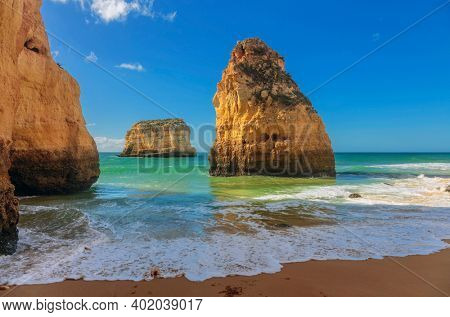The famous beach of Praia dos Caneiros. Algarve.Portugal