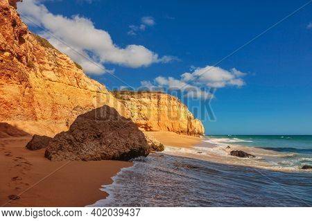 The famous beach of Praia dos Caneiros. Algarve.Portugal