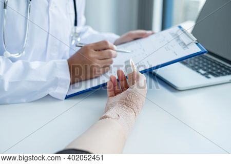 Professional Nurses And Finger Injuries Patients First Aid And Injury Bandage Treatment Use Of Finge
