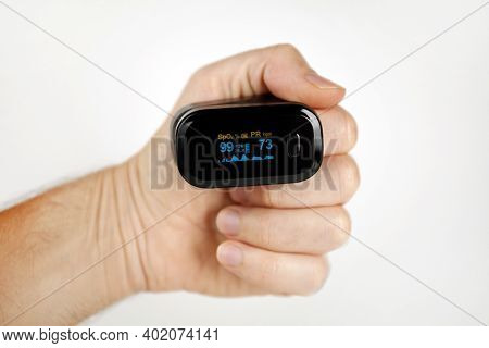 Kiev, Ukraine - 11th November 2020 : Blood Oxygen Saturation. Fingertip Oximeter.