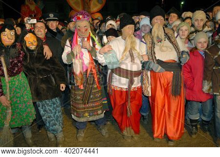 Goroshova, Ternopil Oblast, Ukraine - 14.01.2013: Young man is dressed up in Malanka costume. Malanka celebration in Goroshova village.