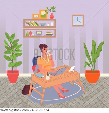 Businesswoman Drinking Coffee Or Tea Working With Laptop Sitting At Table At Home. Smiling Confident