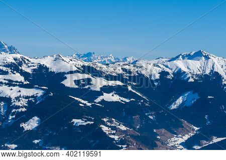 View Of The Snow-capped Mountains In The Schmitten Ski Area In Zell Am See. In The Background Is A B