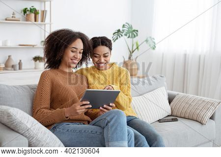 Free Time Together, Shopping, Entertainment And Good Offer Online. Smiling Young African American Fe
