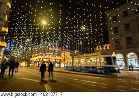 Abstract Blurred Christmas Lights Called Lucy At Illuminated Paradeplatz In Zurich. Millions Of Hang