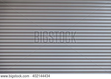 The Texture Of Corrugated Metal Sheet, White Or Grey Slide Door Old Roller Shutter Texture For Backg