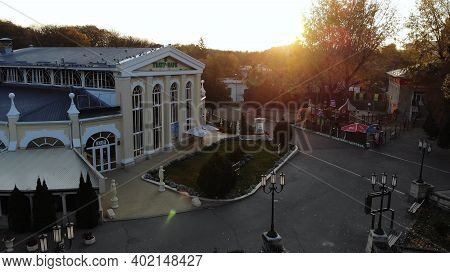 Essentuki, Russia - October 28, 2020: Aerial Fly Over Fountain And Park Theater In Spa Park.