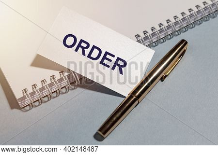 Order Word Inscription On Paper. Business And Law Concept