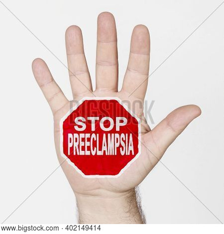 Medicine Concept. On The Palm Of The Hand There Is A Stop Sign With The Inscription - Stop Preeclamp